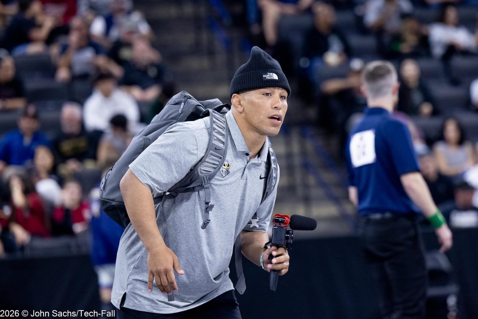 Coach Peyton Omania matside at a tournament