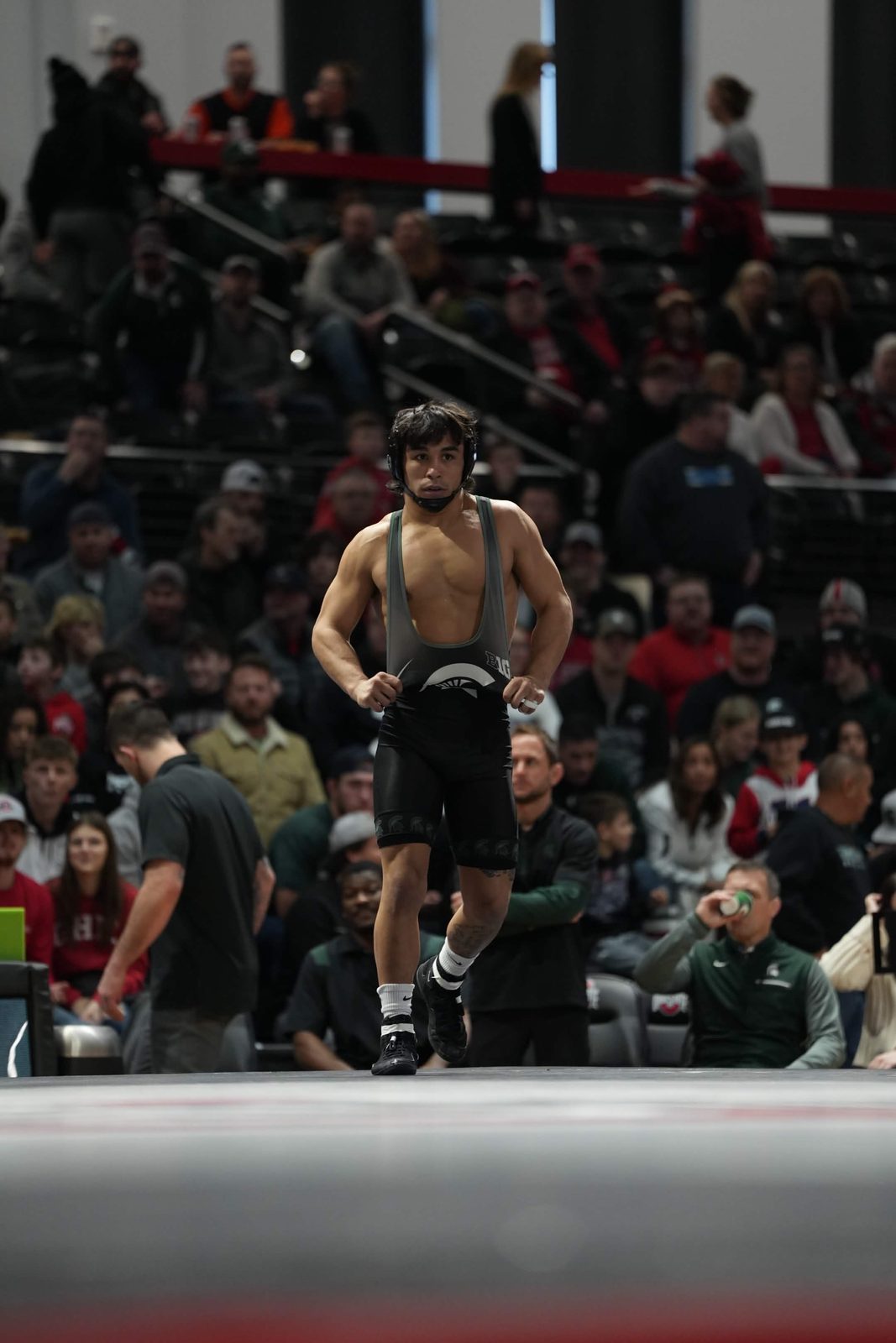 Peyton Omania walking onto the mat for Michigan State