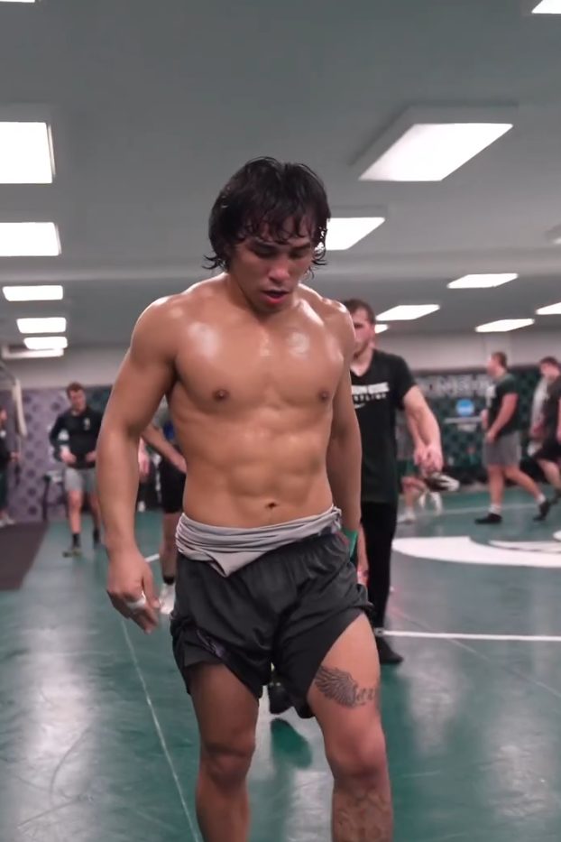 Peyton Omania during a hard practice session in the wrestling room