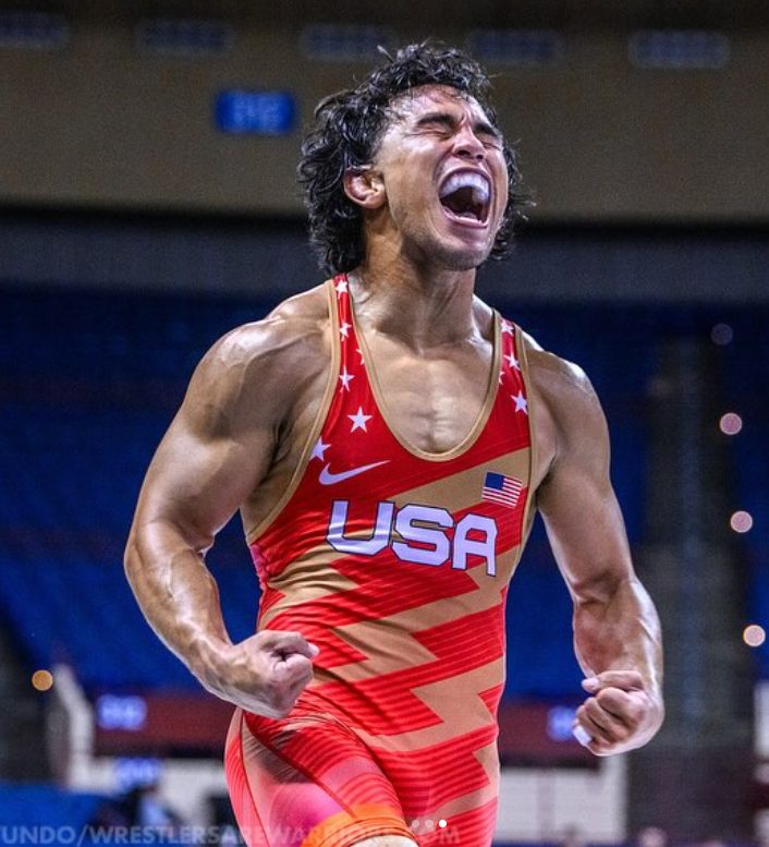Peyton Omania holding up one finger after a Team USA win